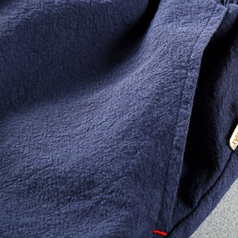 RELAXED LINEN BLEND TROUSERS