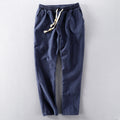 RELAXED LINEN BLEND TROUSERS